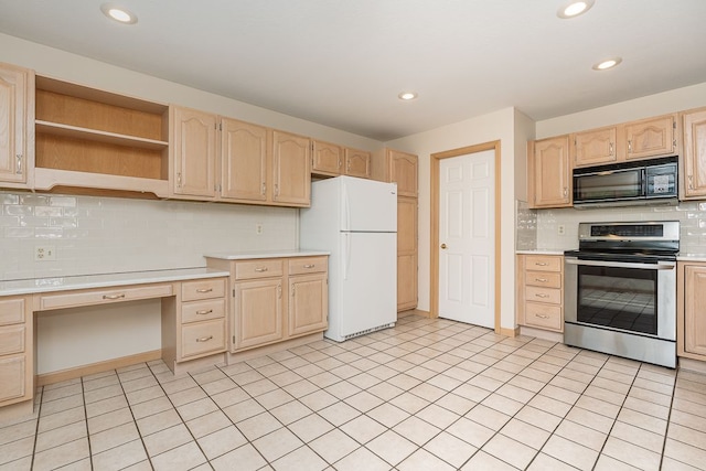 8187 Sawgrass Trl, Grand Blanc, MI 48439 - kitchen with black microwave, stainless steel electric range oven, freestanding refrigerator, light brown cabinets, and light countertops