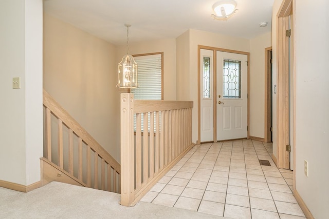 8187 Sawgrass Trl, Grand Blanc, MI 48439 - foyer entrance with baseboards and a chandelier