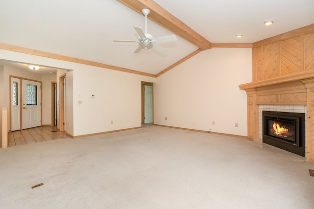 8187 Sawgrass Trl, Grand Blanc, MI 48439 - unfurnished living room featuring light colored carpet, a fireplace, a ceiling fan, and baseboards