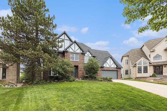 1817 High Pointe Ln, Ann Arbor, MI 48108 - tudor-style house with brick siding, concrete driveway, a front lawn, and a garage