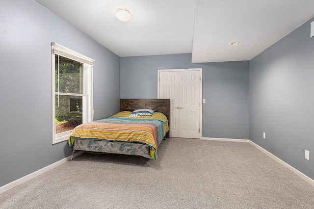 1817 High Pointe Ln, Ann Arbor, MI 48108 - carpeted bedroom featuring baseboards