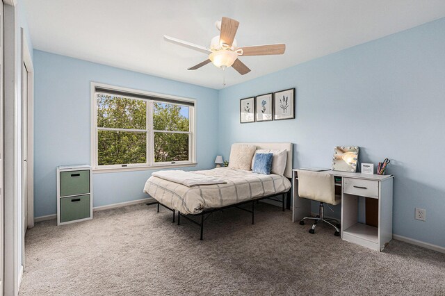 1817 High Pointe Ln, Ann Arbor, MI 48108 - carpeted bedroom featuring baseboards and ceiling fan