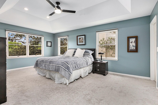 1817 High Pointe Ln, Ann Arbor, MI 48108 - carpeted bedroom featuring a tray ceiling, multiple windows, baseboards, and recessed lighting