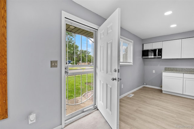 3907 Bayhan St, Inkster, MI 48141 - doorway to outside with baseboards, recessed lighting, and light wood-style flooring