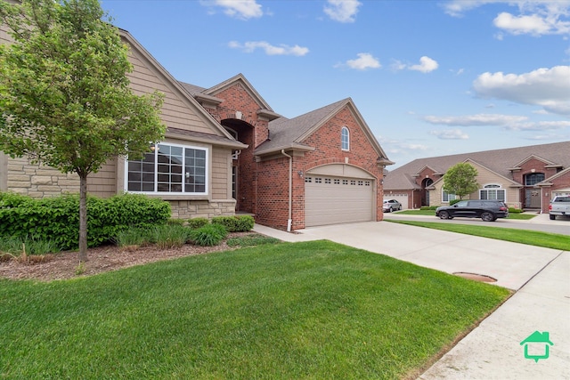 5104 Hawkseye Trce, Warren, MI 48092 - view of front of house with a garage, a front lawn, driveway, stone siding, and a shingled roof