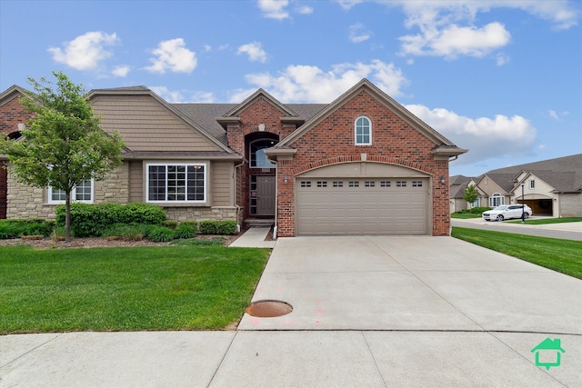 5104 Hawkseye Trce, Warren, MI 48092 - view of front of home featuring concrete driveway, stone siding, a front lawn, and an attached garage