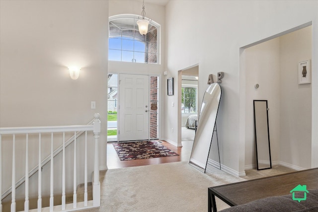 5104 Hawkseye Trce, Warren, MI 48092 - carpeted foyer entrance featuring a high ceiling and baseboards