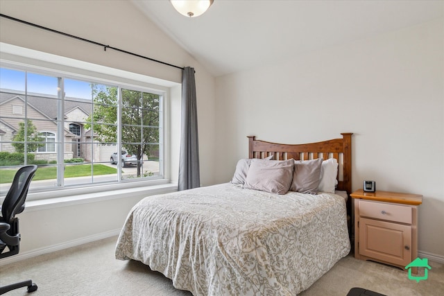 5104 Hawkseye Trce, Warren, MI 48092 - bedroom featuring light carpet, lofted ceiling, and baseboards