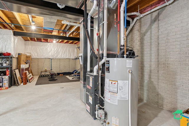 5104 Hawkseye Trce, Warren, MI 48092 - unfinished below grade area with gas water heater and brick wall