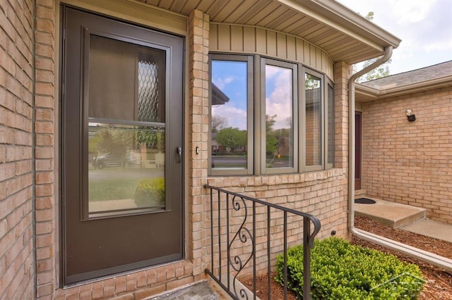 402 Morningside Dr, Midland, MI 48640 - doorway to property with brick siding