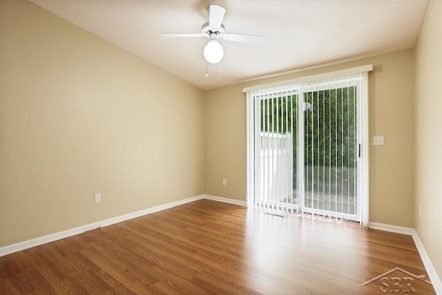 402 Morningside Dr, Midland, MI 48640 - empty room with wood finished floors, ceiling fan, and baseboards