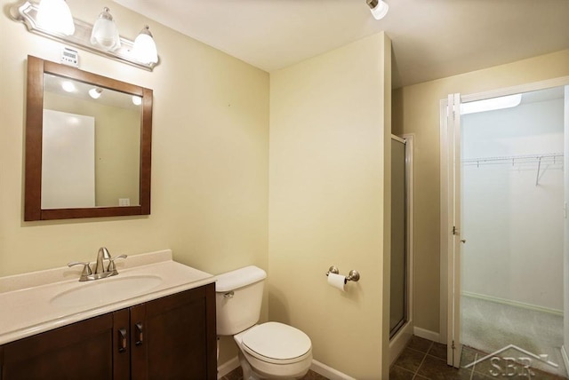 402 Morningside Dr, Midland, MI 48640 - full bathroom with a stall shower, toilet, vanity, and tile patterned flooring
