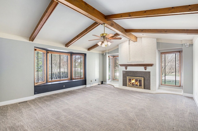 3331 Salem Ct, Rochester Hills, MI 48306 - unfurnished living room featuring baseboards, carpet, a glass covered fireplace, and healthy amount of natural light