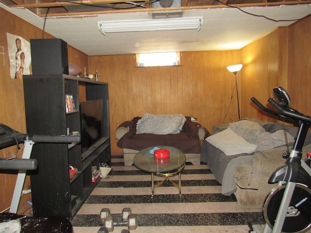 living area featuring wooden walls