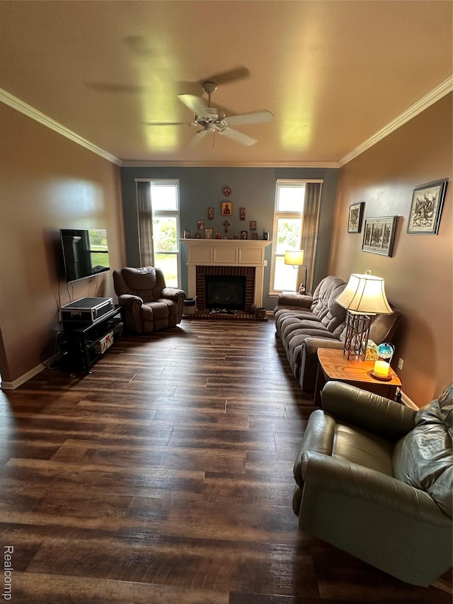 790 Vivian Ln, Oxford, MI 48371 - living room with ceiling fan, ornamental molding, dark wood-type flooring, baseboards, and a brick fireplace