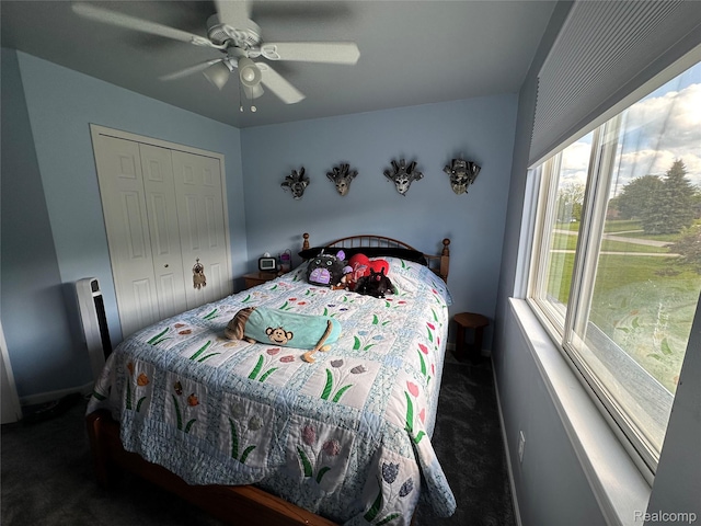 790 Vivian Ln, Oxford, MI 48371 - bedroom with carpet, a closet, a ceiling fan, and baseboards