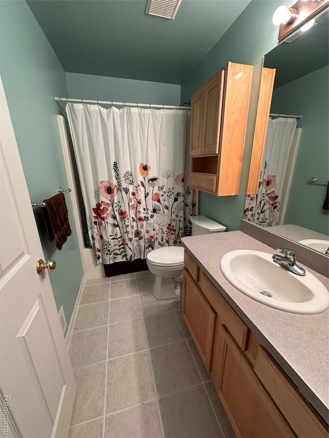 790 Vivian Ln, Oxford, MI 48371 - bathroom with toilet, vanity, tile patterned flooring, and a shower with curtain