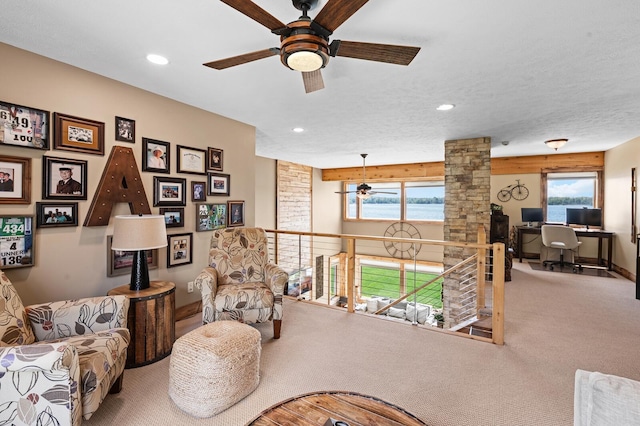 9861 W Doyle Dr, Mecosta, MI 49332 - carpeted living room featuring ceiling fan, an office area, and recessed lighting