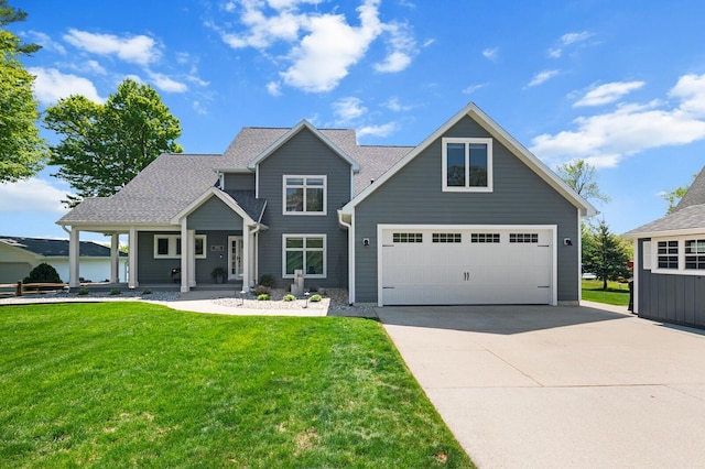 9861 W Doyle Dr, Mecosta, MI 49332 - view of front of house featuring a front yard, concrete driveway, and a porch
