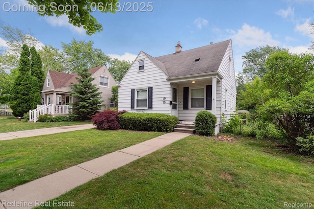 1976 Bacon Ave, Berkley, MI 48072 - view of front of property with a front yard, a chimney, roof with shingles, and covered porch
