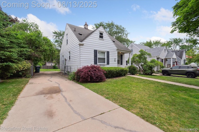 1976 Bacon Ave, Berkley, MI 48072 - bungalow with driveway, a chimney, and a shingled roof