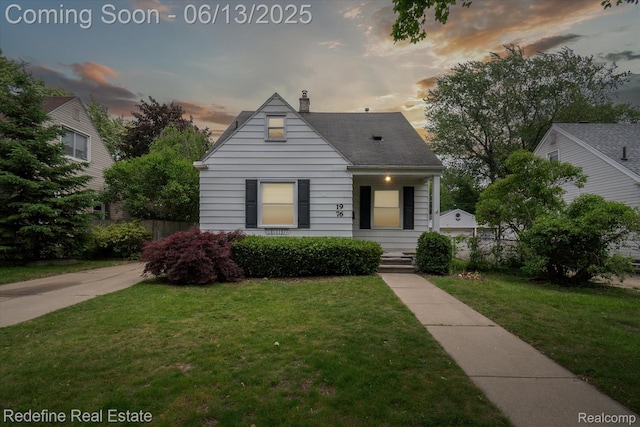 1976 Bacon Ave, Berkley, MI 48072 - view of front of house with a lawn and a chimney