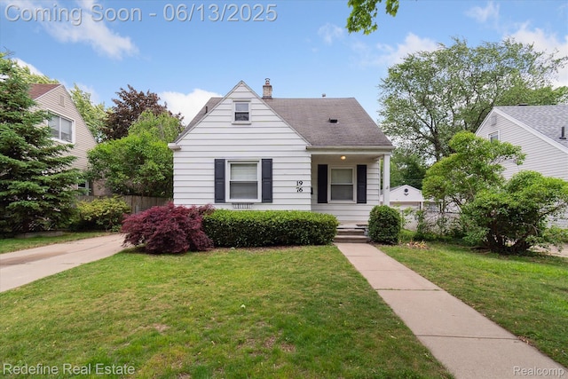 1976 Bacon Ave, Berkley, MI 48072 - view of front facade with a chimney and covered porch