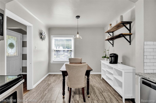 1976 Bacon Ave, Berkley, MI 48072 - dining area featuring light wood finished floors and baseboards