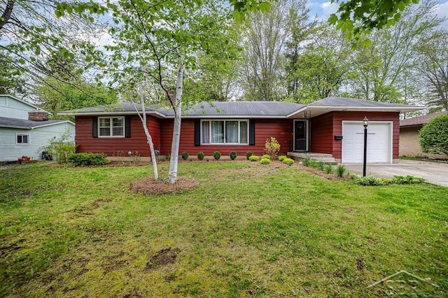 4215 Washington St, Midland, MI 48642 - ranch-style house featuring a garage, driveway, and a front yard