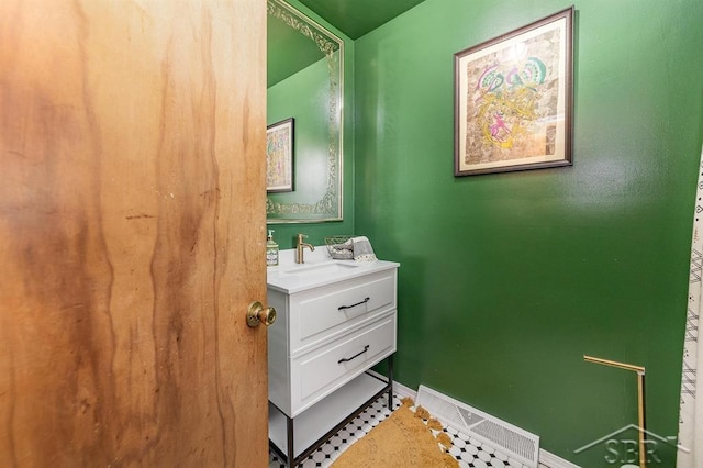 4215 Washington St, Midland, MI 48642 - bathroom with baseboards and vanity