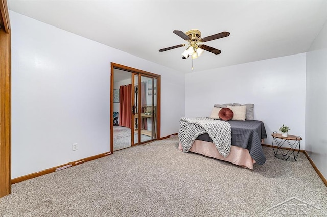 4215 Washington St, Midland, MI 48642 - carpeted bedroom with baseboards, ceiling fan, and a closet