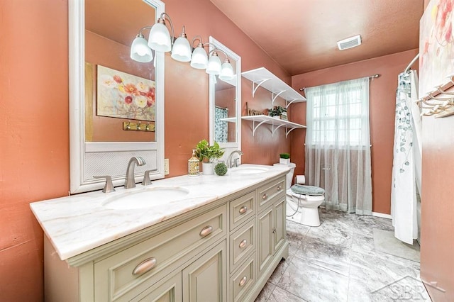 4215 Washington St, Midland, MI 48642 - full bathroom featuring toilet, double vanity, and a shower with shower curtain