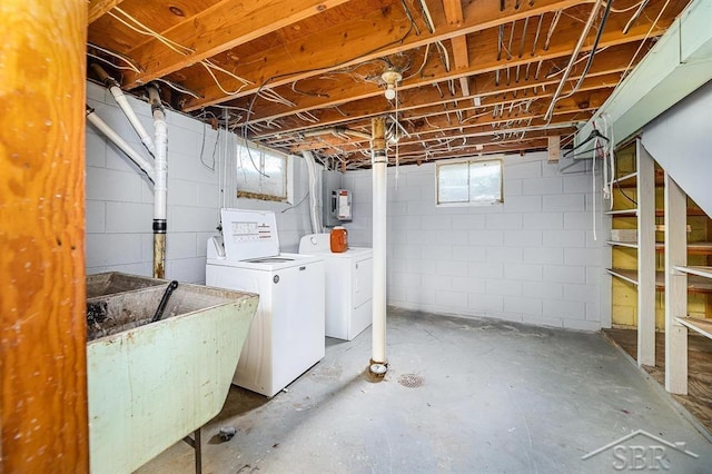 4215 Washington St, Midland, MI 48642 - below grade area featuring washing machine and dryer and a sink