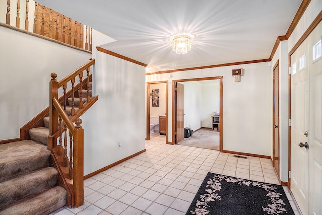 41925 Waterwheel Rd, Northville, MI 48168 - entryway featuring stairway, crown molding, and light tile patterned flooring