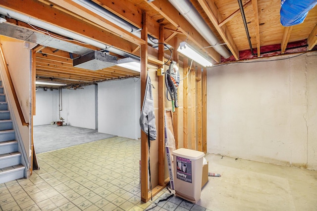 41925 Waterwheel Rd, Northville, MI 48168 - unfinished basement with stairway and tile patterned floors