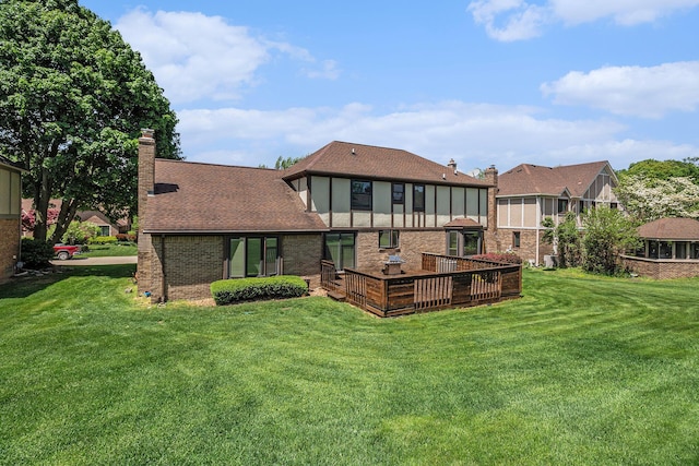 41925 Waterwheel Rd, Northville, MI 48168 - back of house featuring a chimney, a lawn, and brick siding