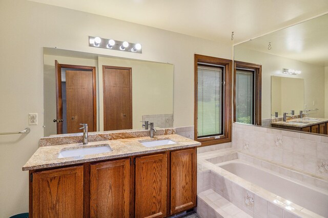 41925 Waterwheel Rd, Northville, MI 48168 - full bathroom with double vanity and a garden tub