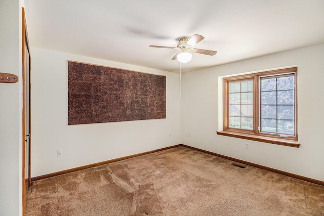 41925 Waterwheel Rd, Northville, MI 48168 - spare room with carpet and a ceiling fan