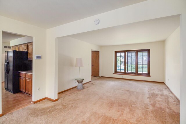 41925 Waterwheel Rd, Northville, MI 48168 - spare room with light colored carpet and a smoke detector