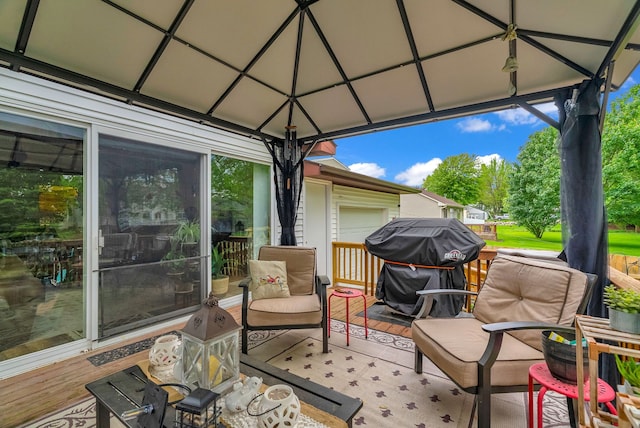 view of patio featuring a grill and a gazebo