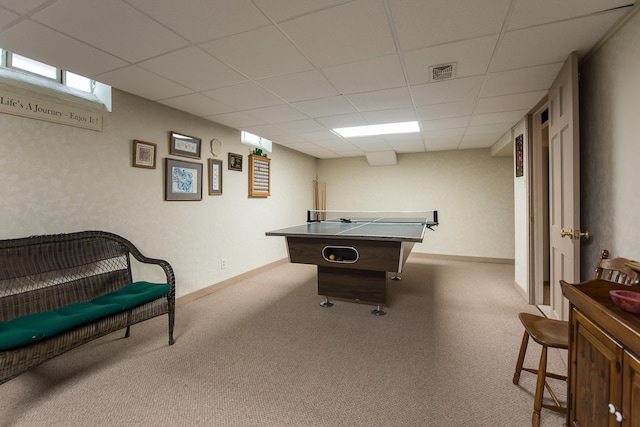 playroom with carpet floors, a drop ceiling, and baseboards