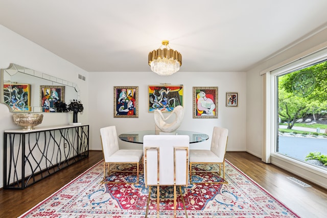 4749 Tara, West Bloomfield, MI 48323 - dining room with wood finished floors, a chandelier, and baseboards