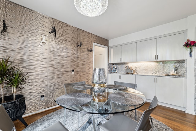 4749 Tara, West Bloomfield, MI 48323 - dining room featuring dark wood-type flooring and a chandelier