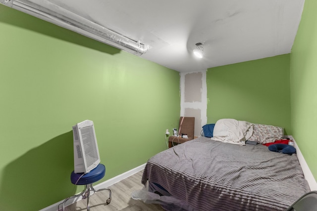 9069 Pierson St, Detroit, MI 48228 - bedroom featuring wood finished floors and baseboards
