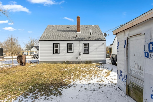 9069 Pierson St, Detroit, MI 48228 - snow covered back of property with a chimney and a shingled roof