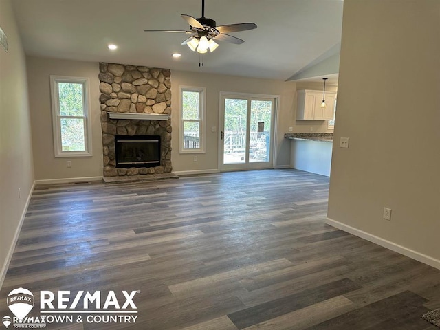 1208 Turrill Rd, Lapeer, MI 48446 - unfurnished living room featuring healthy amount of natural light, baseboards, ceiling fan, recessed lighting, and vaulted ceiling