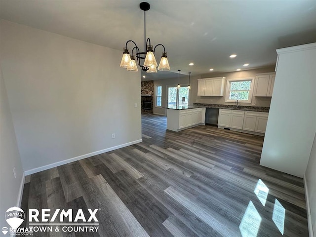 1208 Turrill Rd, Lapeer, MI 48446 - kitchen with a sink, a chandelier, recessed lighting, white cabinets, and dark wood finished floors