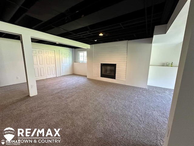 1208 Turrill Rd, Lapeer, MI 48446 - below grade area with carpet flooring and a fireplace