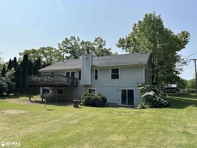 1208 Turrill Rd, Lapeer, MI 48446 - rear view of house featuring a deck, a yard, and a chimney