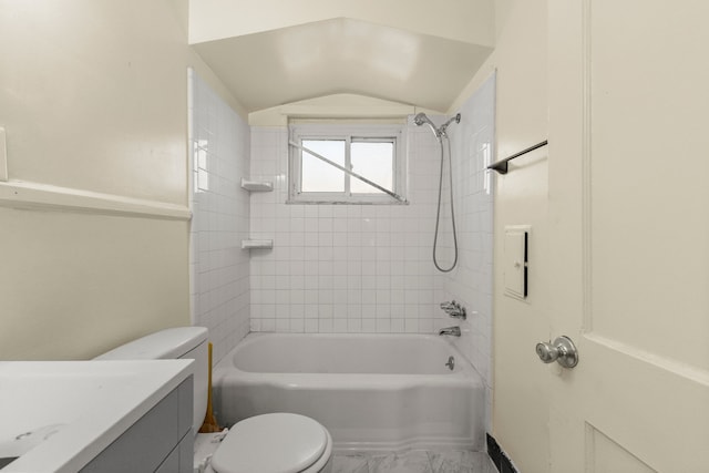 7285 Mansfield St, Detroit, MI 48228 - bathroom featuring toilet, marble look tiles, shower / bathtub combination, vanity, and vaulted ceiling